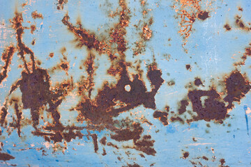 Rusty Colored Metal Texture. The Old Iron Surface Is Worn. Cracked Paint