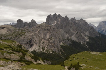 Hiking and climbing at the stunning Passo Giau in the Dolomite mountains of Northern Italy