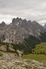 Obraz premium Hiking and climbing at the stunning Passo Giau in the Dolomite mountains of Northern Italy