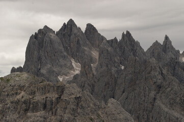 Hiking and climbing at the stunning Passo Giau in the Dolomite mountains of Northern Italy