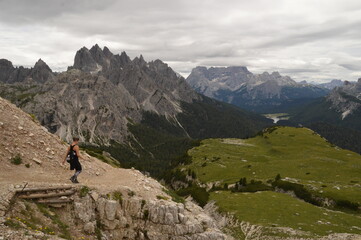 Fototapeta na wymiar Hiking and climbing at the stunning Passo Giau in the Dolomite mountains of Northern Italy
