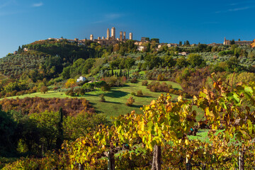 a fall cityscape of San Gimignano, Italy - obrazy, fototapety, plakaty