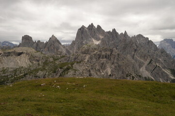 Hiking and climbing at the stunning Passo Giau in the Dolomite mountains of Northern Italy