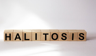 Halitosis text, written on wooden cubes and a white background.