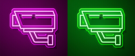 Glowing neon line Security camera icon isolated on purple and green background. Vector.