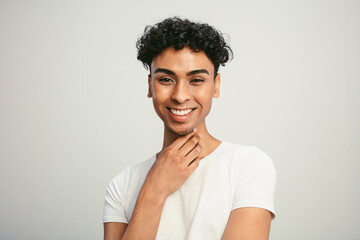 Handsome gay man on white background
