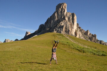 Hiking and climbing at the stunning Passo Giau in the Dolomite mountains of Northern Italy
