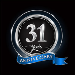 Celebrating 31st years anniversary logo. with silver ring and blue ribbon.