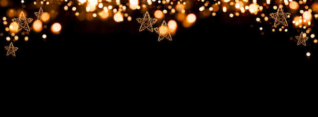 Christmas garland with bokeh
Festive golden christmas garland with glowing bokeh against black...
