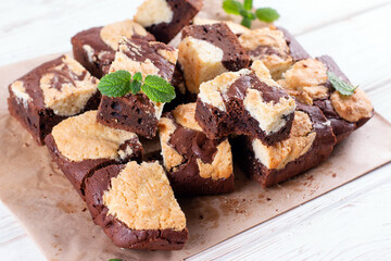 Brookies — Half brownie, half cookie dough bar cookie sliced by squares