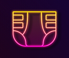 Glowing neon line Adult diaper icon isolated on black background. Vector.