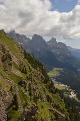 Fototapeta premium Hiking and climbing in the stunning valleys and mountains of Val di Fiemme in the Dolomites, Italy