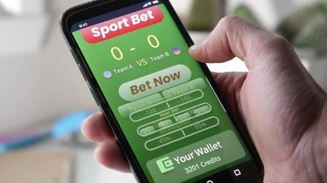 Placing a sports bet online on a smartphone app. Choosing which team will win and betting online. Gambling money on Internet.