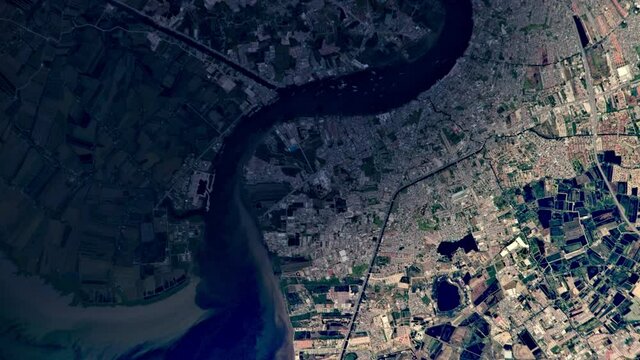 City and river sunrise aerial satellite view animation Bangkok Thailand Chao Phraya river. Images furnished by Nasa