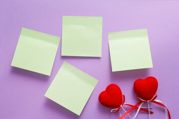 Stickers for notes on a purple background and two hearts. valentine's day, love note.