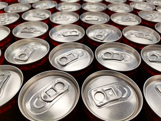 Carbonated drinks. Cans of drinks. Canned drinks at the grocery store