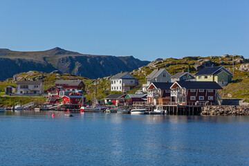 Fototapeta na wymiar Picturesque harbor in small coastal town Gjesvaer in the Northern polar Norway, Finnmark