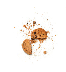 One broken Chocolate chip cookie isolated on white background. Sweet biscuit crumbs. Homemade pastry