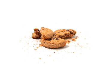 One broken Chocolate chip cookie isolated on white background. Sweet biscuit crumbs. Homemade pastry