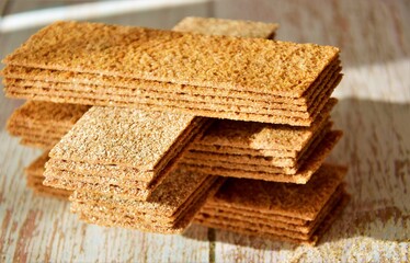 crispy, thin rye bread on a wooden table