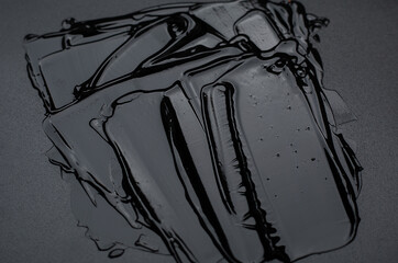 cosmetic gel smears on black background