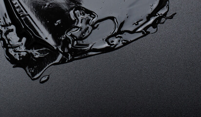 leaked cosmetic gel on black background