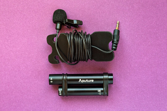 Orenburg, Russia 04 11 2020 Lapel microphone Aputure. Microphone with cord editorial Microphone with long cable amplifier and power supply