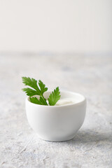 White sauce, seasonings for dishes, served in white bowls Copyspace
