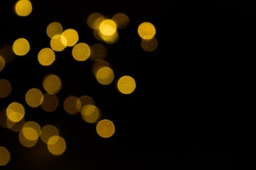 The golden side's or boke on a black background. Merry Christmas and happy New Year. Christmas background.