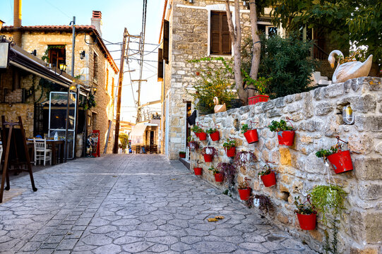 Street with flowers in Afitos, Halkidiki, Greece