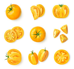 Set of fresh whole and sliced yellow tomatoes isolated on white background