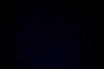 Obraz premium Dark sky background with white stars in Greece