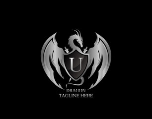 Silver Dragon Shield with U Letter Design Logo Template. © bintank