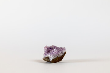 Amethyst. Stone, energetic quartz on a white background.