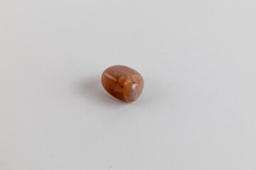 Tiger eye stone. Stone, energetic quartz on a white background.