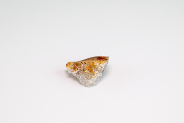 Orange and white. Stone, energetic quartz on a white background.