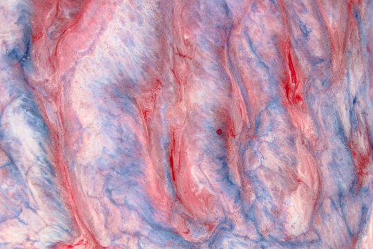 Macro photo of abctract red and blue resin art