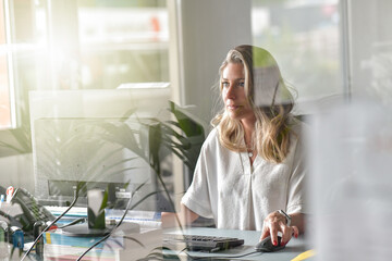 Bussiness woman working at her desk