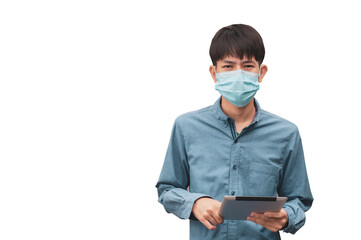 Asian man wearing face mask protect coronavirus COVID 19 and Holding tablet