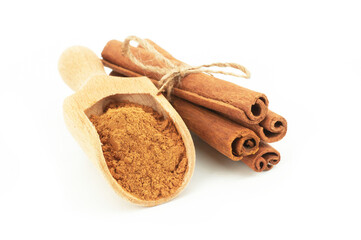 Cinnamon sticks and cinnamon powder isolated on white background, healthy spice, (Cinnamomum)