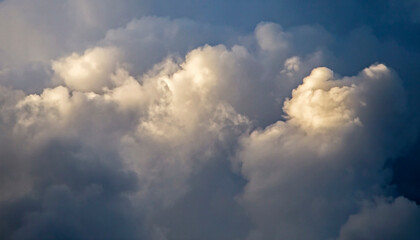 Cumulus clouds in the sunset light. Abstract composition of dramatic sky.