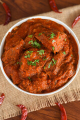 Spicy red fish curry  Goan style fish vindaloo ,  chilly  fish curry Indian Food curry Goa India ....
