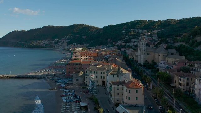 drone shot of the city of Laigueglia, Liguria during sunset