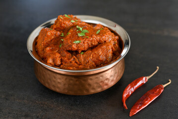 Spicy red fish curry  Goan style fish vindaloo ,  chilly  fish curry Indian Food curry Goa India ....
