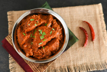 Spicy red fish curry  Goan style fish vindaloo ,  chilly  fish curry Indian Food curry Goa India ....