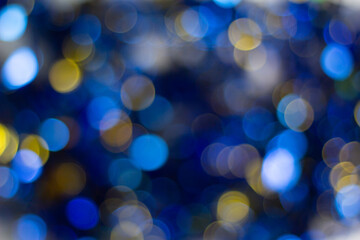 Photo of bokeh design light style new blue theme or cool color abstract pattern blurred background used in Christmas and New Year or celebration.