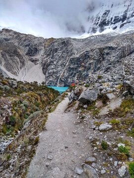Laguna Paron, Huaraz, Peru. A blue-green lake in the Cordillera Blanca on the Peruvian Andes. At 4185 meters above sea level, it's surrounded by snowy peaks and a pyramid mountain. 