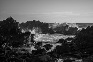 black and white picture of a rocky coast 