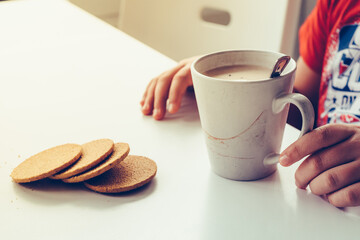 Closeup shot of cookies and coffee on the table