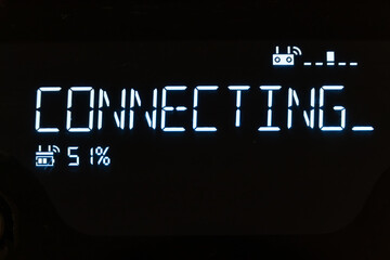 A text message that appears with a deep glow: connect. Luminous text on the computer screen,...